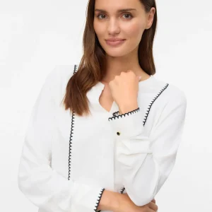 CAMISA BLANCA CON DETALLES EN NEGRO